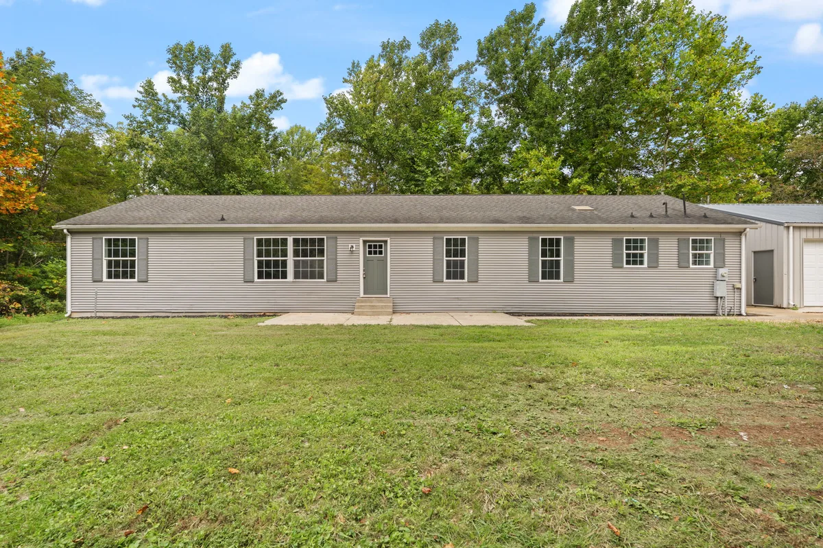 A doublewide manufactured home on its own land in Southern Indiana